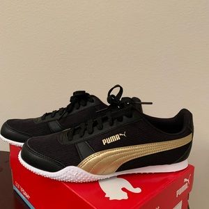Never worn PUMA Black and Gold Soft Foam sneakers!